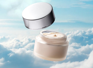 Topical cannabis cream jar with clouds background